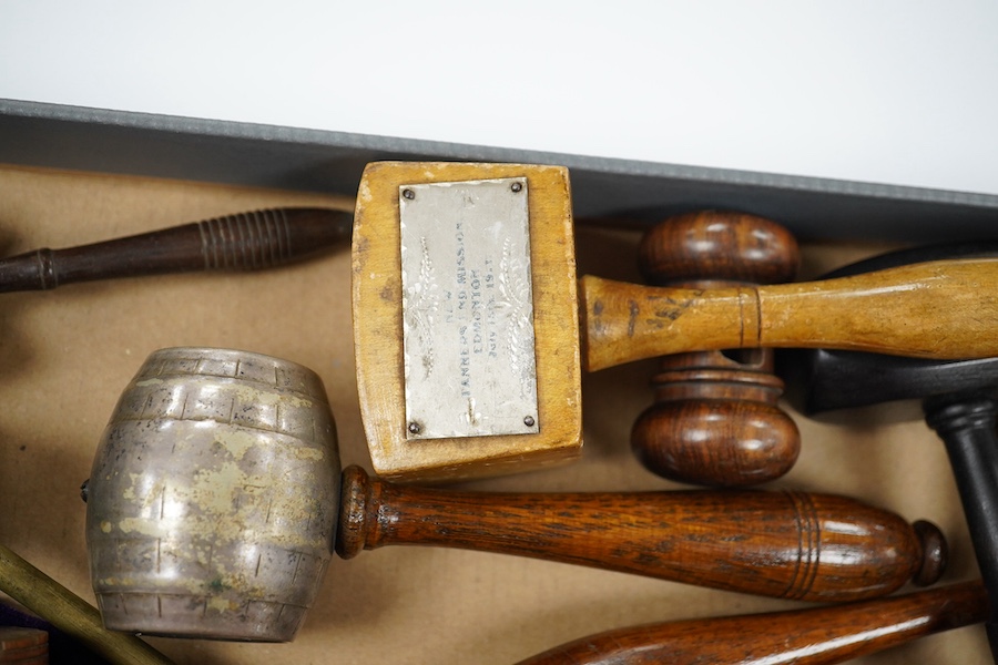 A collection of assorted wooden and metal gavels, largest 27cm long. Condition - used, poor, fair and good